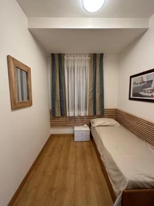 Postel nebo postele na pokoji v ubytování Villa Eribis