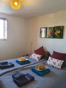 Postel nebo postele na pokoji v ubytování Casa Olivar B&B