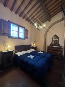 A bed or beds in a room at Hotel Villa Maya