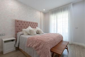 Кровать или кровати в номере Los Alamos Beach Flat