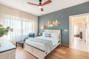 Postel nebo postele na pokoji v ubytování Harmonious Apartment in Loft Cap Cana D4D + 18 fotografií