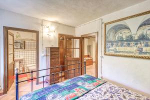 Postel nebo postele na pokoji v ubytování Maison Enchantée
