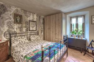 Postel nebo postele na pokoji v ubytování Maison Enchantée