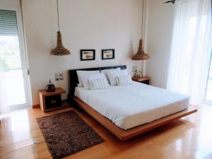 Postel nebo postele na pokoji v ubytování Villa Ino