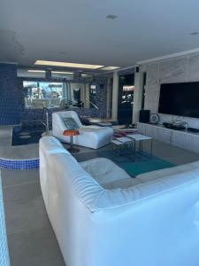 Кровать или кровати в номере Residência Angra Deep Blue