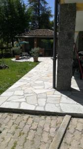 Vonkajšia záhrada v ubytovaní Villa Laura
