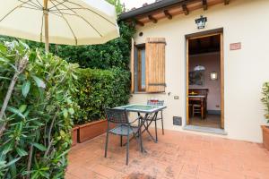 A patio or other outdoor area at Agriturismo Vecchio Borgo Di Inalbi