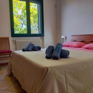 Giường trong phòng chung tại Casa Miclari