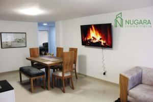 TV a/nebo společenská místnost v ubytování Apartamento Super-Confortable