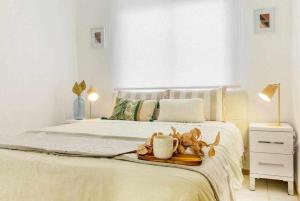 Posteľ alebo postele v izbe v ubytovaní Apartamento Pink VistaBella Sunrise