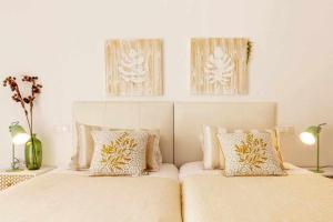 Posteľ alebo postele v izbe v ubytovaní Apartamento Pink VistaBella Sunrise