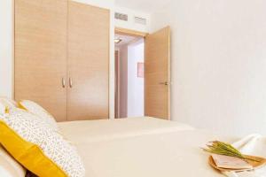Posteľ alebo postele v izbe v ubytovaní Apartamento Pink VistaBella Sunrise