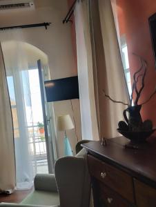 Телевизор и/или развлекательный центр в Sokratis Apartments