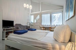 Postel nebo postele na pokoji v ubytování Fewo Eg Links - Hunde erlaubt