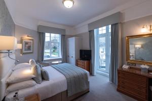 Katil atau katil-katil dalam bilik di The Belmont Hotel - Adults Only +56 gambar
