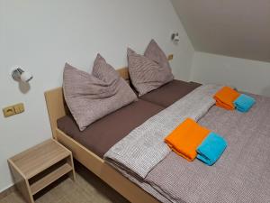Posteľ alebo postele v izbe v ubytovaní Apartmány Adieu 2