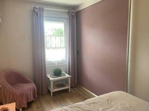 Postel nebo postele na pokoji v ubytování Le Wembley Superbe appartement