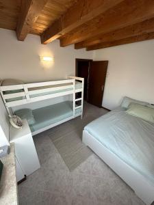 Postel nebo postele na pokoji v ubytování Casa Matilde - Residence Cà Vecchia