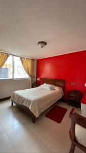 Postel nebo postele na pokoji v ubytování HOTEL El INDIO