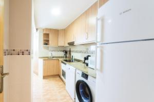 Kuchyňa alebo kuchynka v ubytovaní Brisa Marina - Apartamento a 3 minutos andando de la playa
