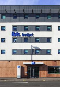 a hospital building with a doctors bucket sign on it at ibis budget London Hounslow in Hounslow