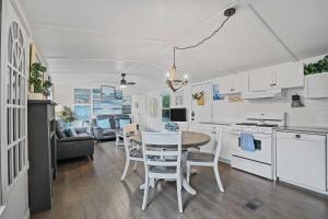 a kitchen and dining room with a table and chairs at Boat and Fish on Lewisville Lake Pet-Friendly Haven in Lake Dallas