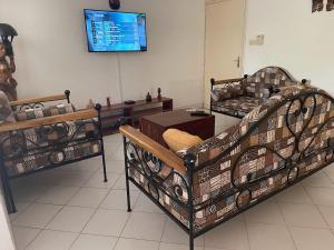 Ένα ή περισσότερα κρεβάτια σε δωμάτιο στο VILLA SOMONE avec piscine privée, à 150 m de la plage
