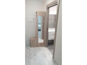 a bathroom with a mirror and a sink at Mundobriga in Munébrega