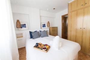 Posteľ alebo postele v izbe v ubytovaní Brisa Marina - Apartamento a 3 minutos andando de la playa