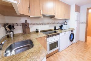 Kuchyňa alebo kuchynka v ubytovaní Brisa Marina - Apartamento a 3 minutos andando de la playa