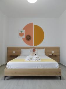 Krevet ili kreveti u jedinici u okviru objekta Iris Apartments Ksamil
