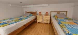 Posteľ alebo postele v izbe v ubytovaní Vito Apartman