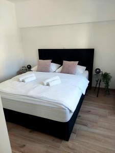 Postel nebo postele na pokoji v ubytování House Kala N29