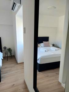 Postel nebo postele na pokoji v ubytování House Kala N29