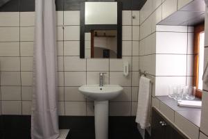 A bathroom at Evanthea Residence