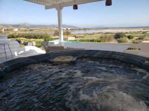 a large plunge pool in the backyard of a house at Blueberry Villa in Naxos Chora