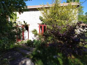 Vonkajšia záhrada v ubytovaní La maison du Caï
