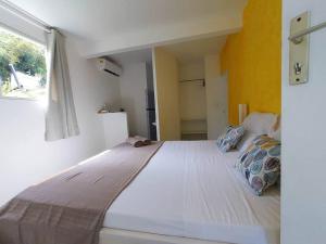 Postel nebo postele na pokoji v ubytování Bold'Air piscine, vue mer + 15 fotografií