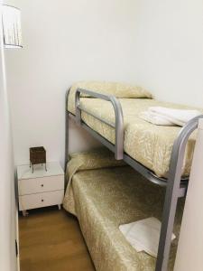 Posteľ alebo postele v izbe v ubytovaní la casita de salou