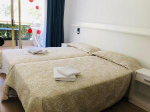 Posteľ alebo postele v izbe v ubytovaní la casita de salou