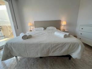 Postel nebo postele na pokoji v ubytování La Carmeta Apartament
