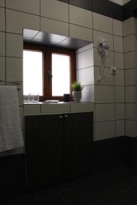 A kitchen or kitchenette at Evanthea Residence