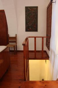 A bed or beds in a room at Evanthea Residence
