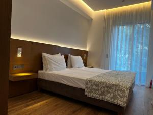 Letto o letti in una camera di Rustemi