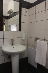 A bathroom at Evanthea Residence