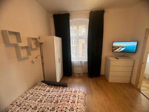 Postel nebo postele na pokoji v ubytování Quiet Apartments + 2 fotografie
