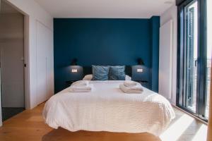 Cama o camas de una habitación en tuGuest Obispo Apartment
