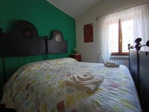 Postel nebo postele na pokoji v ubytování Tottavilla Affittacamere
