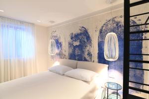 Posteľ alebo postele v izbe v ubytovaní Borelli Palace & Borelli Blue