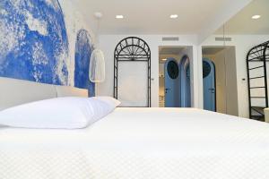 Posteľ alebo postele v izbe v ubytovaní Borelli Palace & Borelli Blue